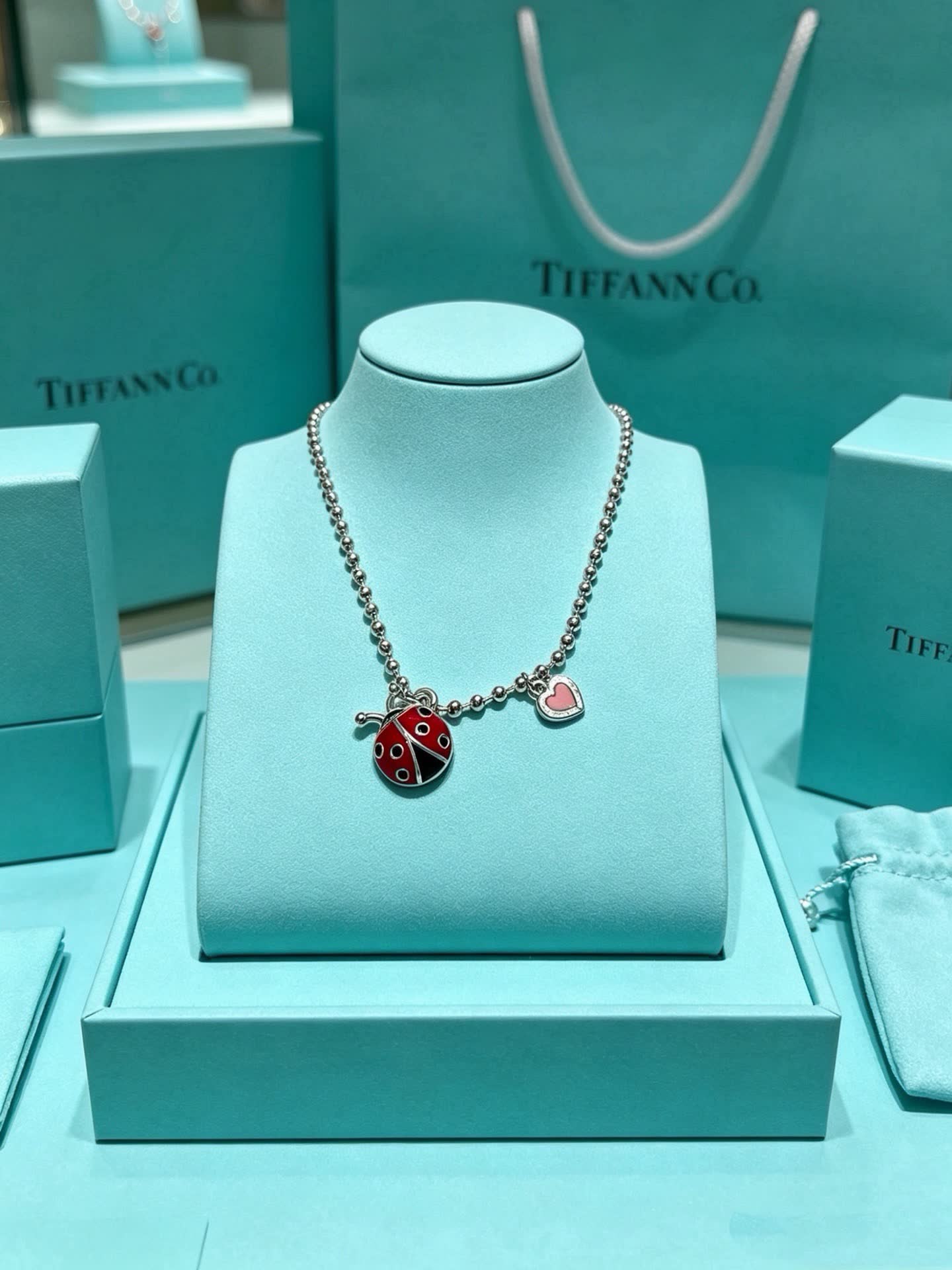 Tiffany & Co. Silver Beaded Necklace with Ladybug and Heart Charms